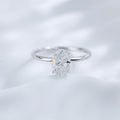 Oval cut lab grown diamond four-prong solitaire ring by Lune Diamond