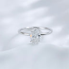 Oval cut lab grown diamond four-prong solitaire ring by Lune Diamond