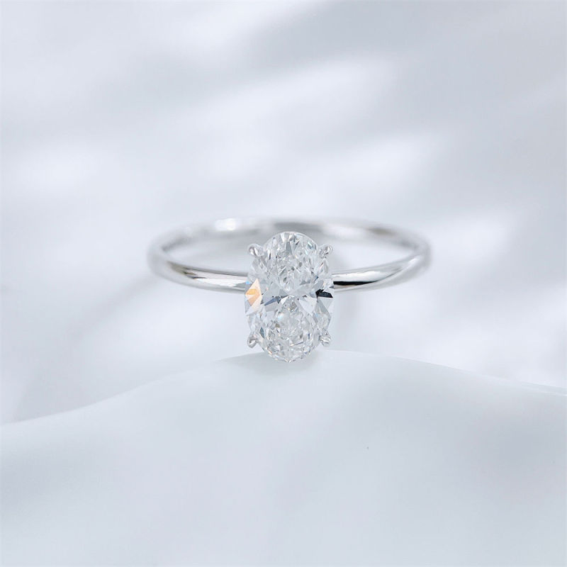 Oval cut lab grown diamond four-prong solitaire ring by Lune Diamond