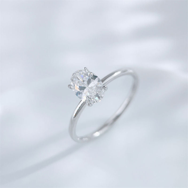 Oval Cut Diamond Four-Prong Solitaire Ring