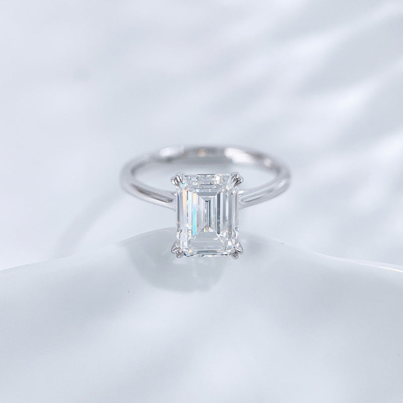 Emerald cut lab grown diamond eight-prong solitaire ring by Lune Diamond
