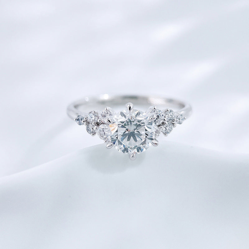 Round and marquise cut lab grown diamond cluster ring by Lune Diamond