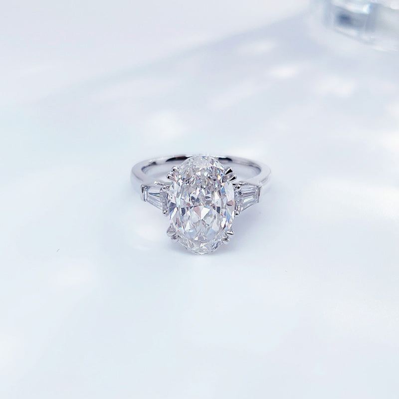 Oval cut lab grown diamond three-stone ring by Lune Diamond