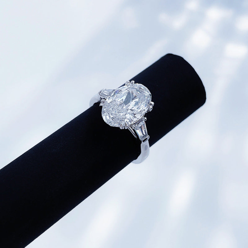 Oval Cut Diamond Three-Stone Ring