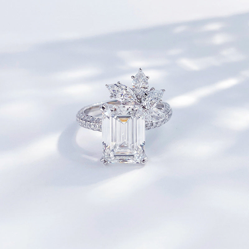 Emerald cut lab grown diamond tiara halo ring by Lune Diamond