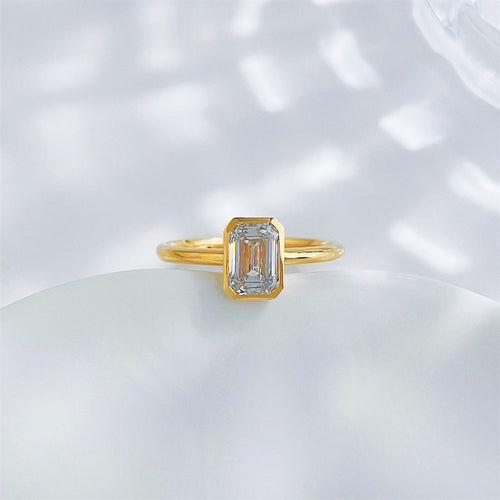 Emerald cut lab grown diamond bezel solitaire ring by Lune Diamond