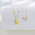 Yellow emerald cut lab grown diamond pendant necklace by Lune Diamond