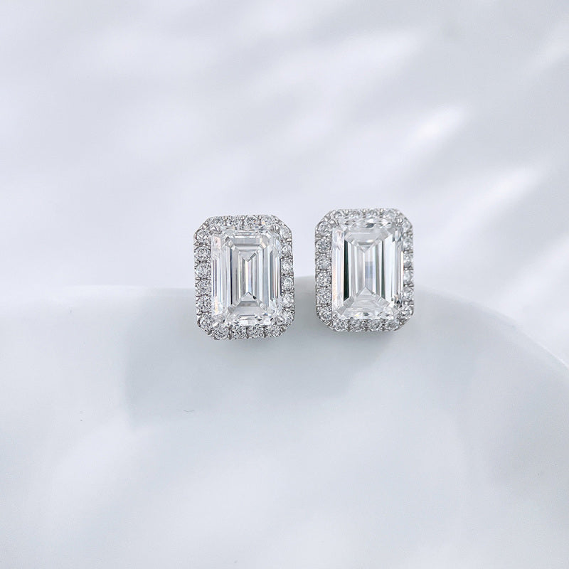 Emerald cut lab grown diamond halo stud earrings by Lune Diamond