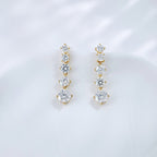 Graduating lab grown diamond line drop earrings by Lune Diamond