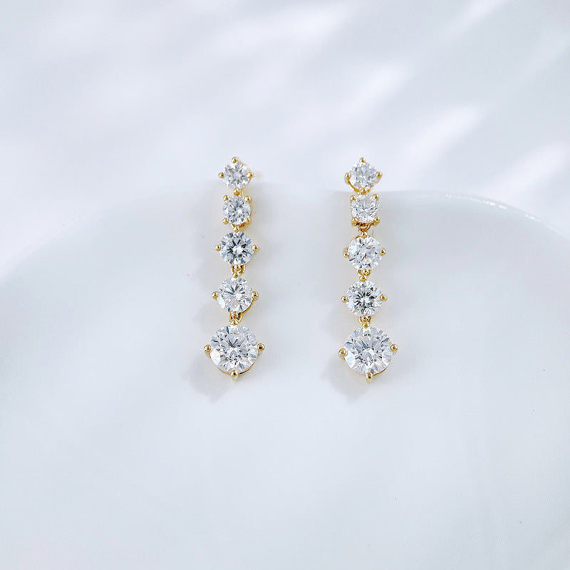 Graduating lab grown diamond line drop earrings by Lune Diamond